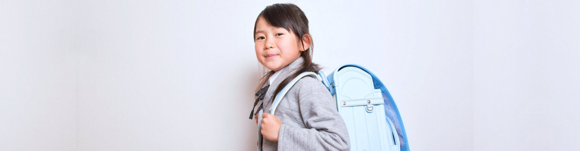 girl carrying a backpack